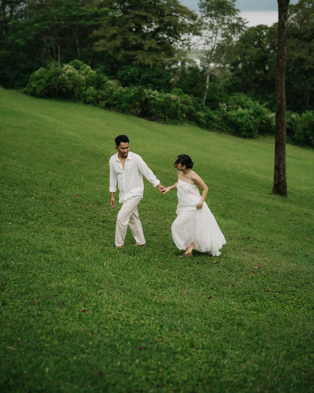 Walking hand in hand through the green